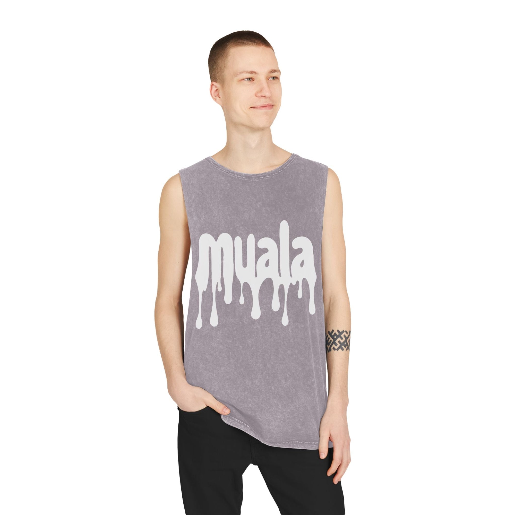 man wearing muala® "hot mualan" stonewash tank top with dripping logo and raw sleeve edges