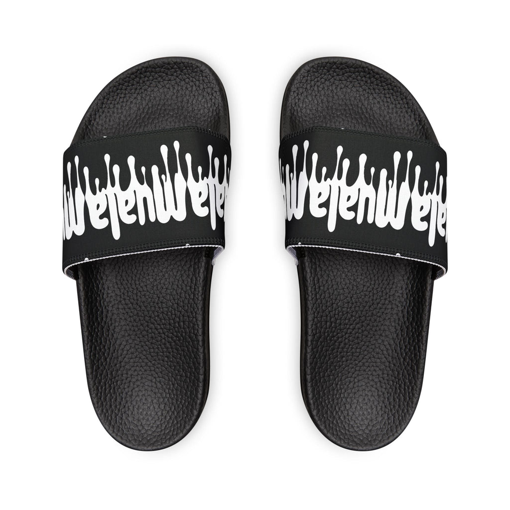 Top view of black Muala® flip fat flop men's sandals with white drip design on straps and textured footbed