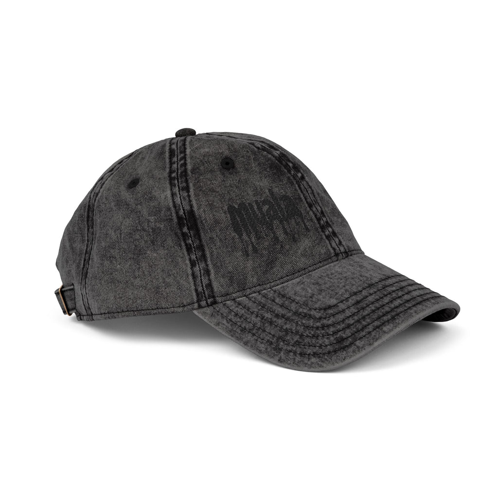 Black distressed Muala® "sunday pizza" cap with black embroidered logo on right front panel and adjustable antique brass buckle.