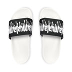 Top view of Muala® flip fat flop men's sandals with black removable straps featuring white drip-style logo on textured white cushioned soles designed for comfort and durability.