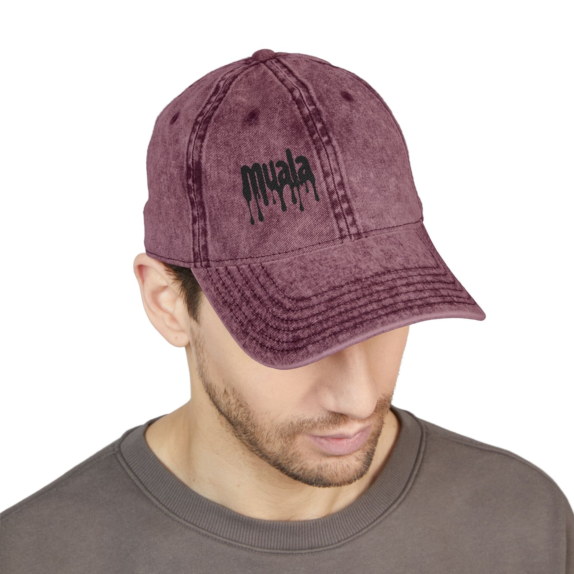 Vintage maroon Muala® "sunday pizza" cap with distressed cotton twill and black logo embroidery on front panel worn by model
