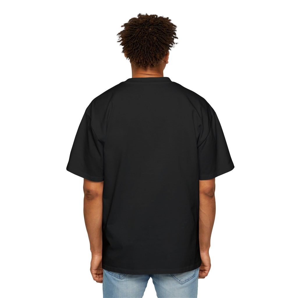 Back view of man wearing black muala® "drippy fat" heavy oversized tee with dropped shoulder design and relaxed fit