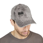 grey distressed cotton twill baseball cap with black embroidered muala logo on right front panel worn by