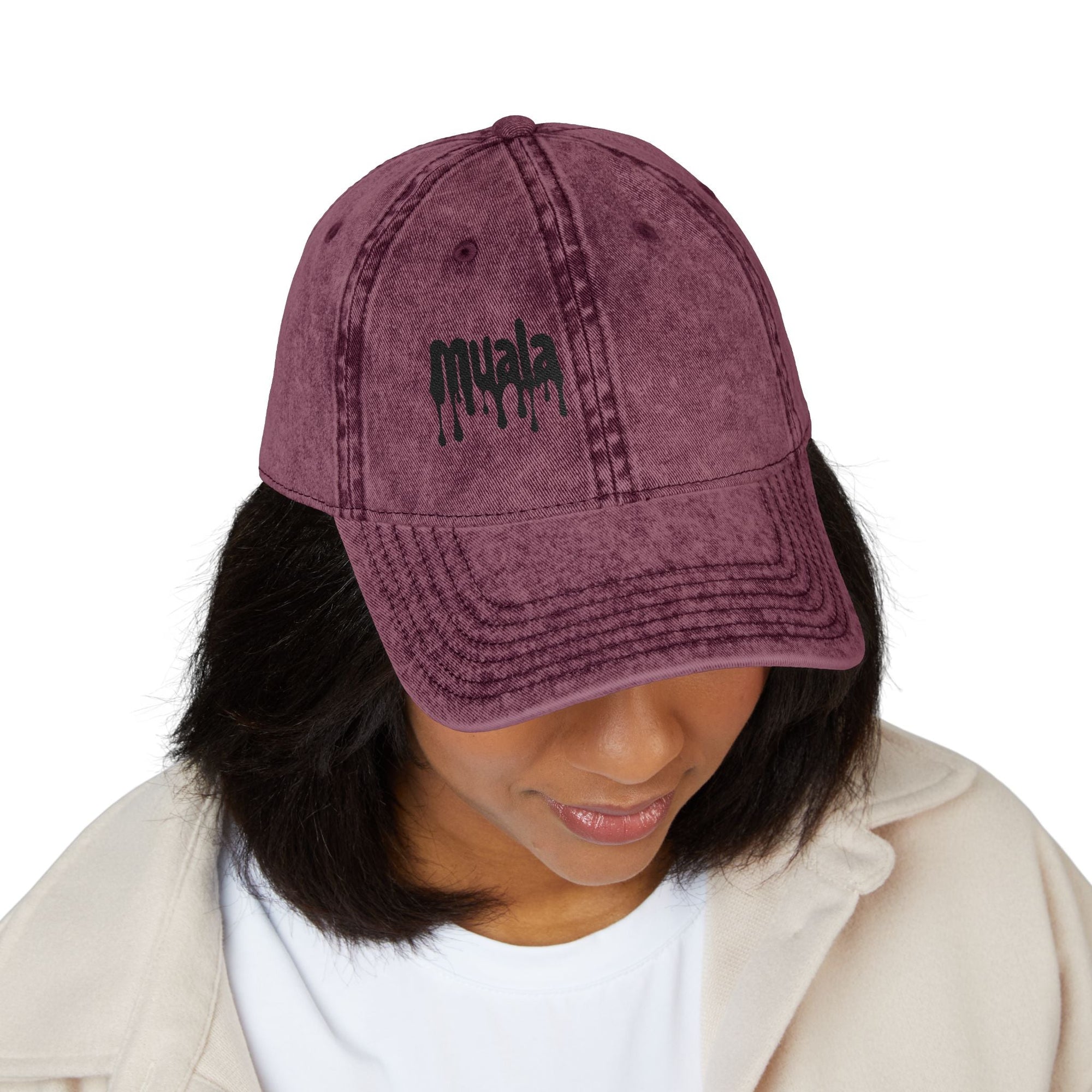 vintage maroon Muala® "sunday pizza" cap with black embroidered logo worn by person