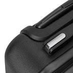 Close-up of black textured travel wrap suitcase corner with integrated lock and handle detailing