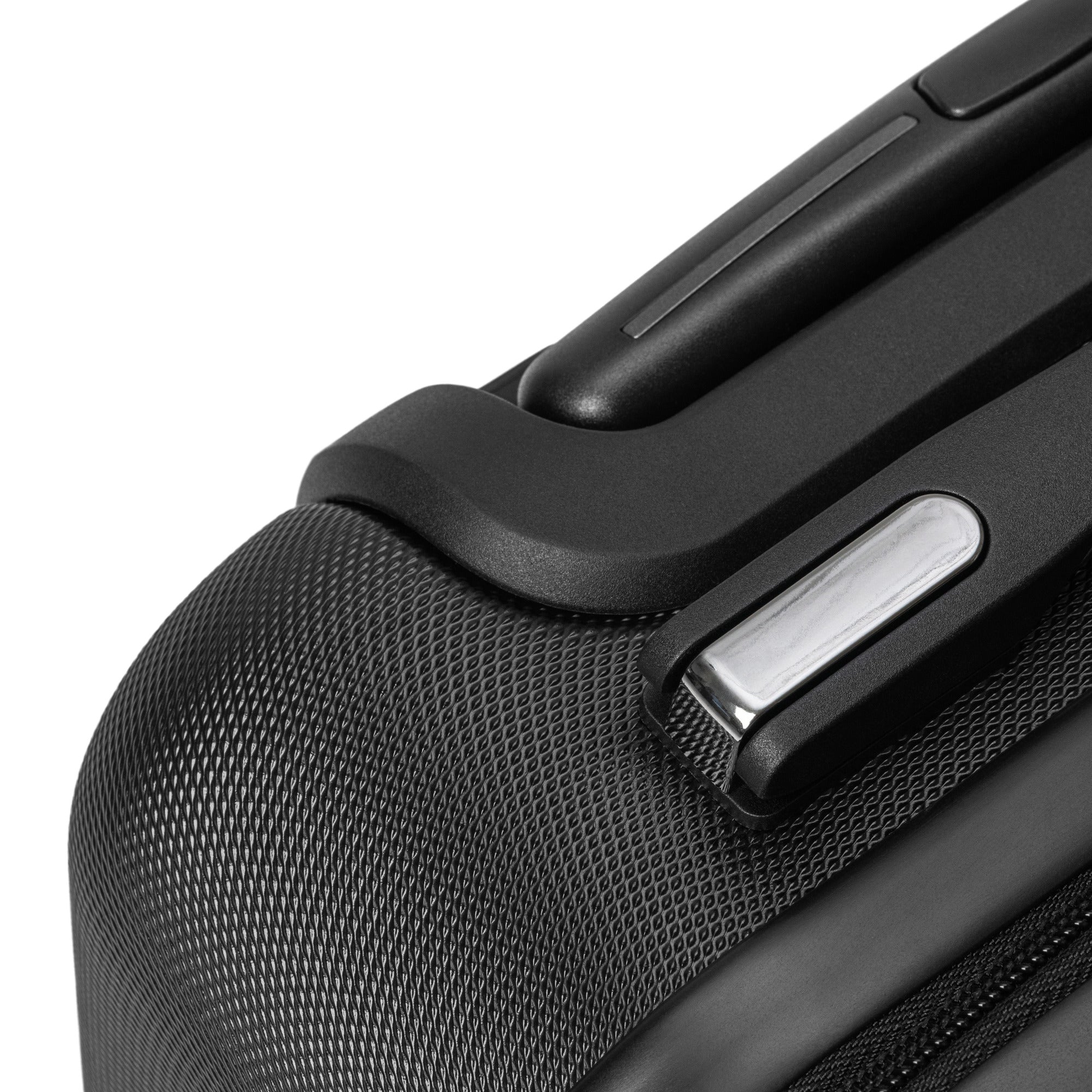 Close-up of black textured travel wrap suitcase corner with integrated lock and handle detailing